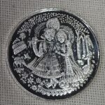 RADHA KRISHNA 10GM SILVER COIN JALAAN 999 FINE SILVER COIN buy gold coins online, buy silver coins online, gold bullion coins, silver bullion coins, gold coins for investment, buy gold bullion bars, best place to buy gold online, gold coin prices today, silver coin price today, investing in gold and silver, gold bullion coins for sale, gold buyers near me, sell gold near me, gold and silver buyers near me, we buy gold and silver near me, 1g gold coin, 10g silver coin, silver idol for pooja, custom gold murti, Diwali silver idols online, wedding gold murti gifts, gold coin investment tips, how to invest in gold bullion, precious metals, investment-grade bullion, pure silver coins, religious idols, murti figurine, custom puja idols, premium gold bars
